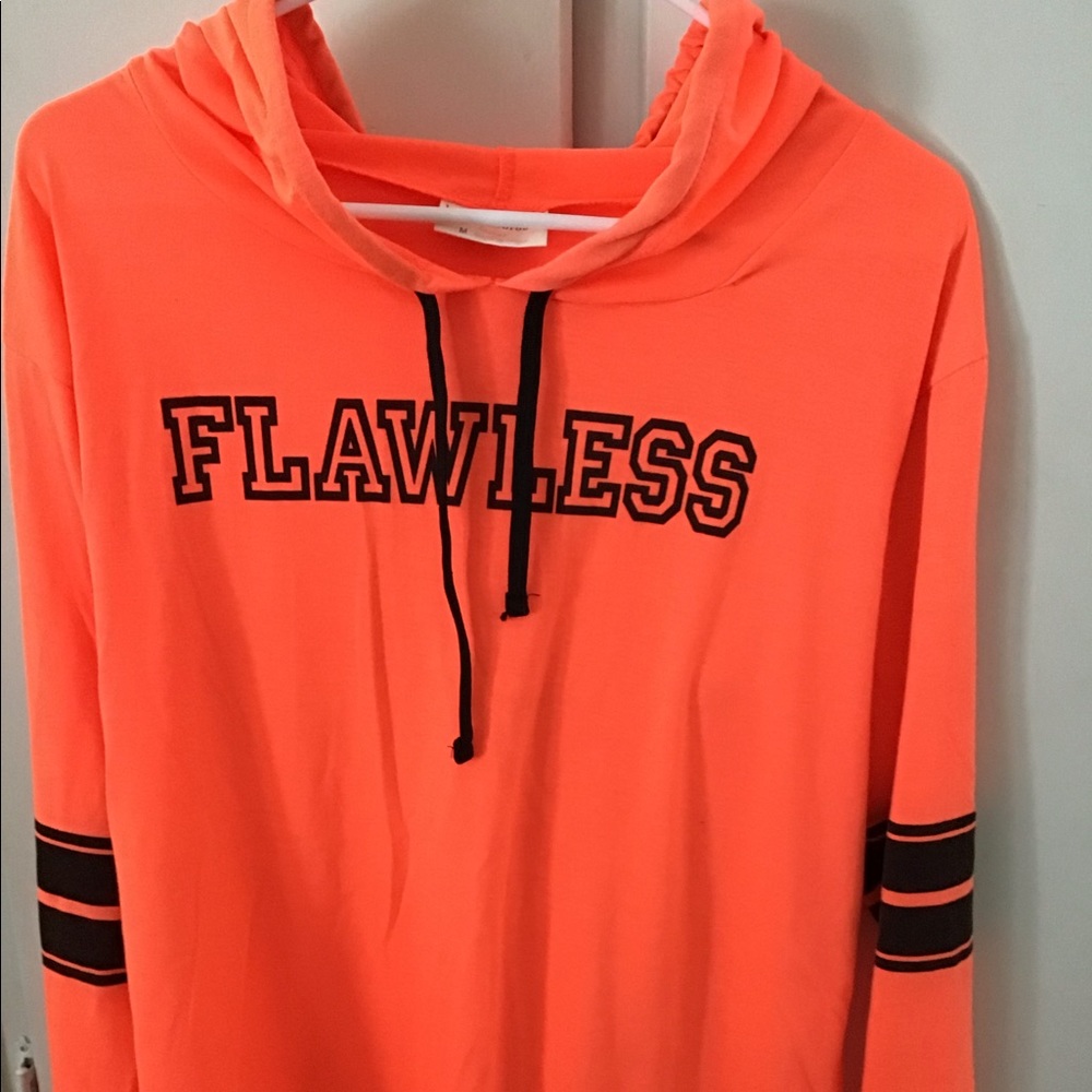 Lightweight, bright coral colored pullover hoodie